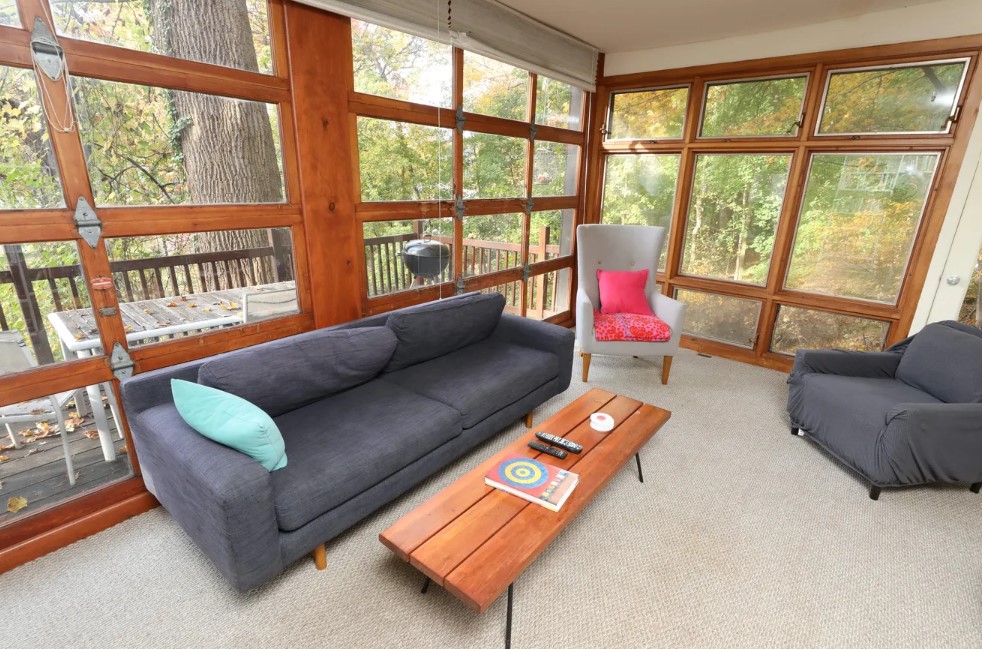 The artist installed floor-to-ceiling garage-door style rollup windows to add light to his studio. Photo by Mark Vergari/The Journal News